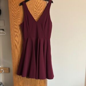 Elegant Burgundy Sleeveless Dress with Pockets